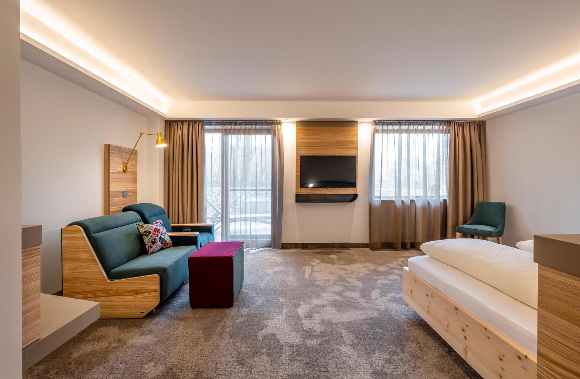 Hotel Frechdachs Бад-Фюссинг Экстерьер фото